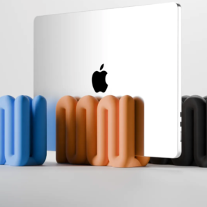 Apple MacBook placed in Wibble Aesthetic Vertical Laptop Stand by TREEDKW