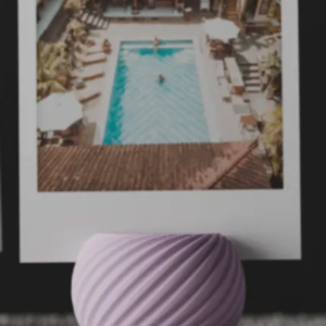 Modern Twisted Spiral Photo Holder on tabletop